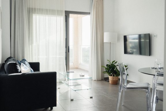 Living area, dining area and sea view