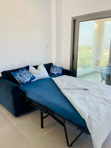 The sofa bed can sleep up to two overnight guests.